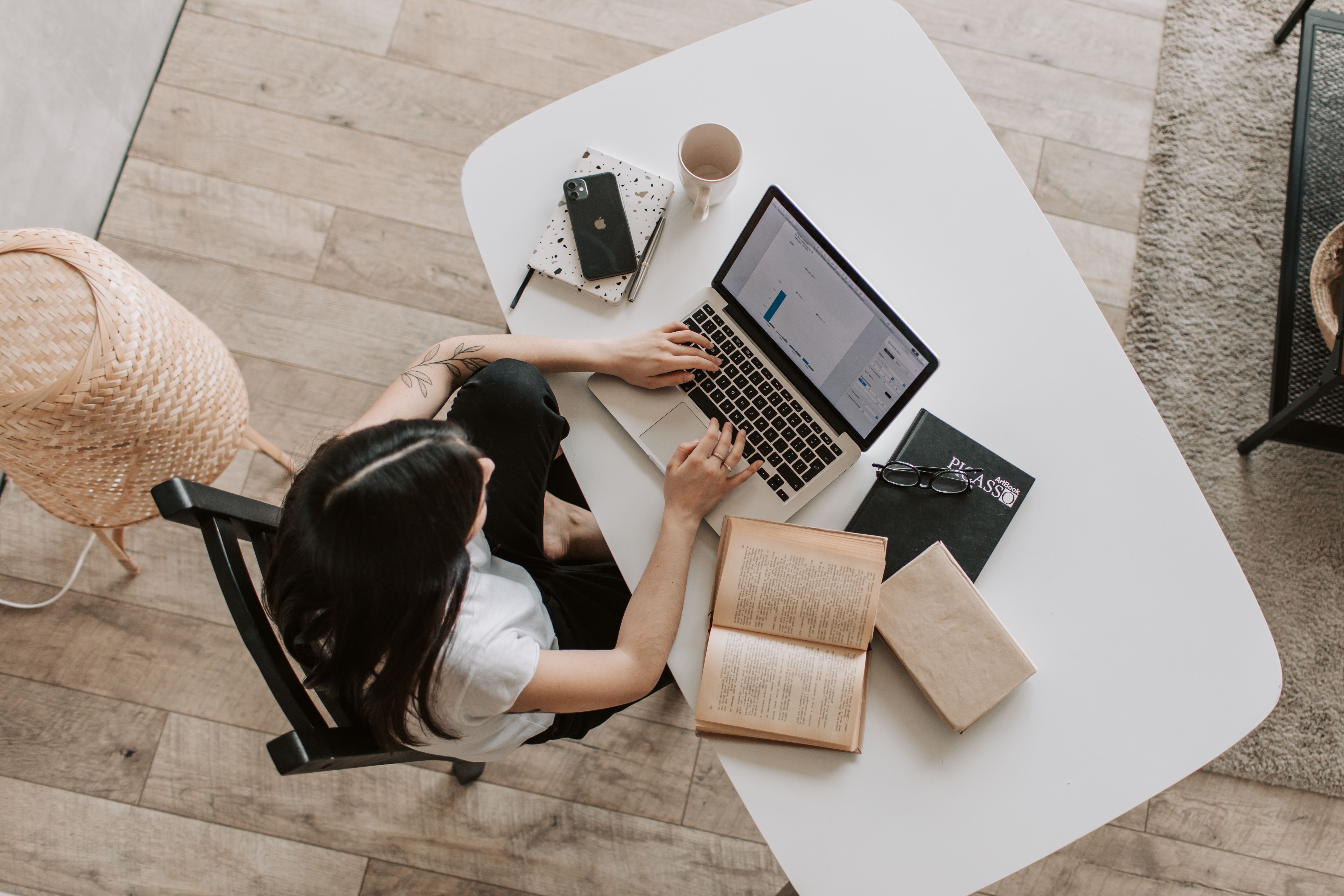 Freelancer working on laptop in home office
