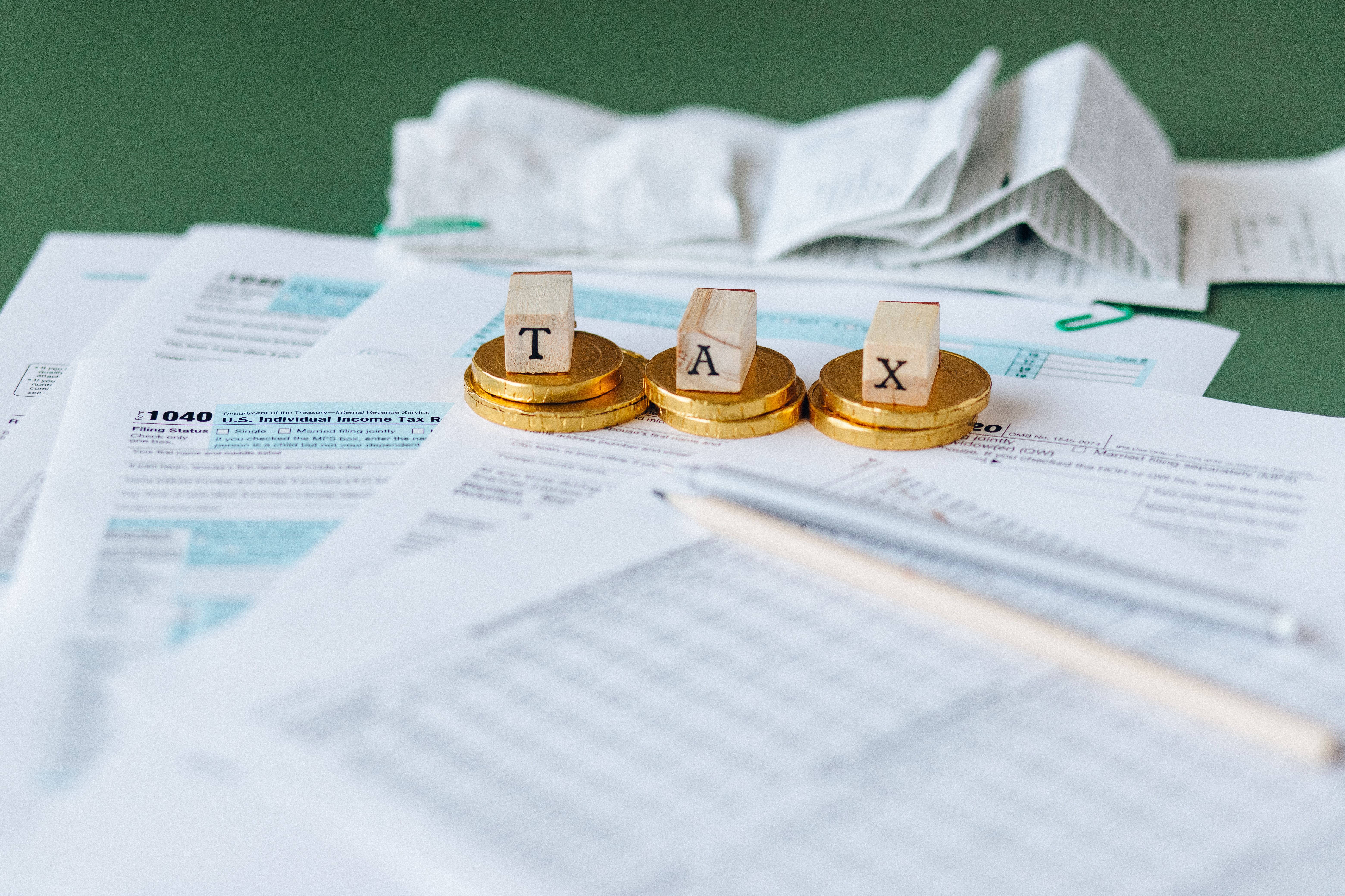 Credit report documents on a desk with a pen